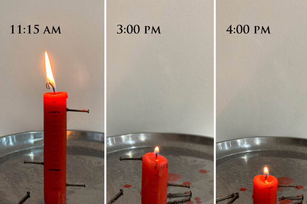 L'orologio a candela segna il passaggio dal mattino al pomeriggio. (The Epoch Times)